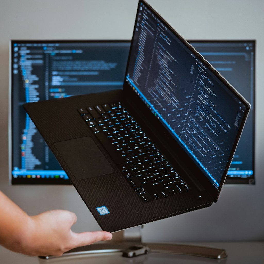 Turned-on laptop computer, representing the cost of AI website translation