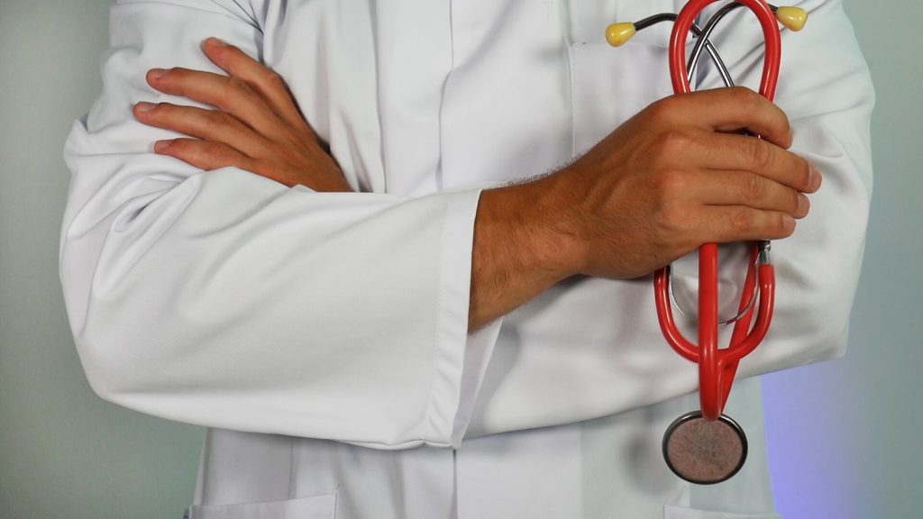 Doctor holding a stethoscope representing healthcare and medical services