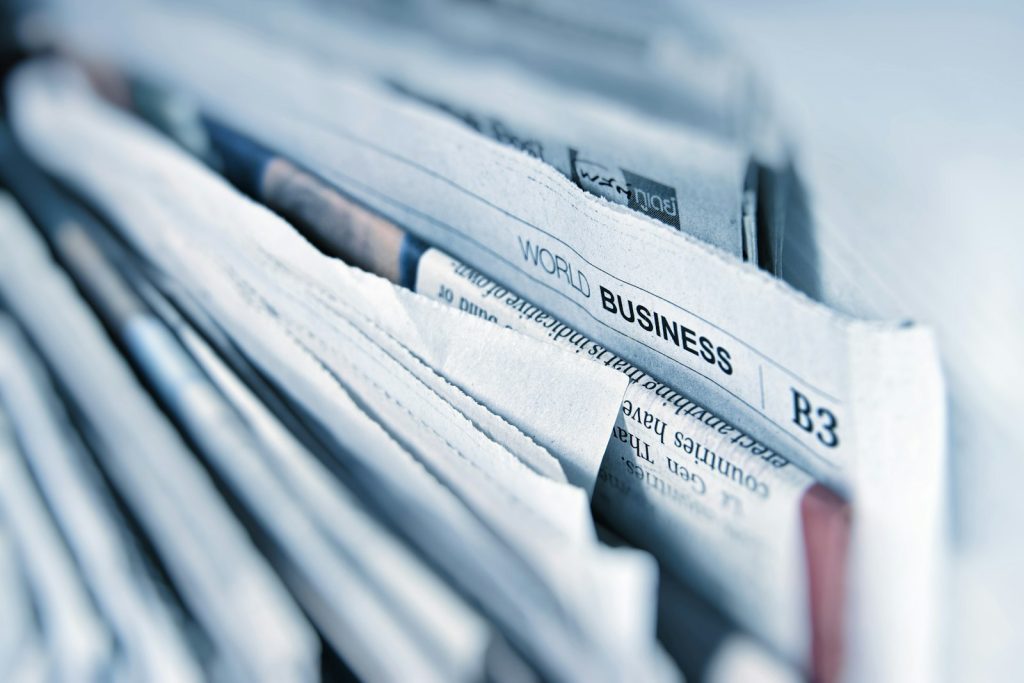 Business newspaper article representing news and publishing