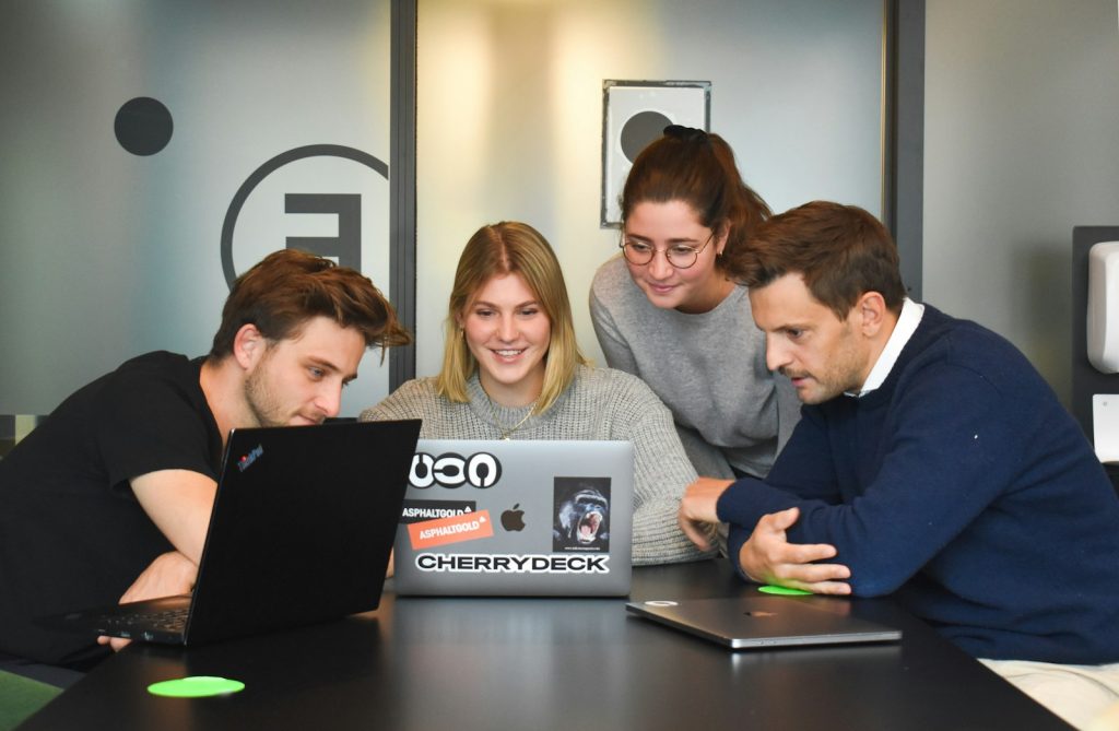 Team working on SaaS software in a modern office
