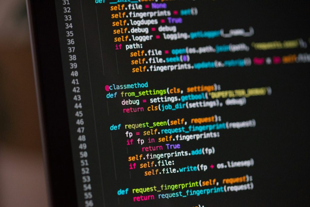 Computer screen with code, representing AI translation of WordPress custom post types