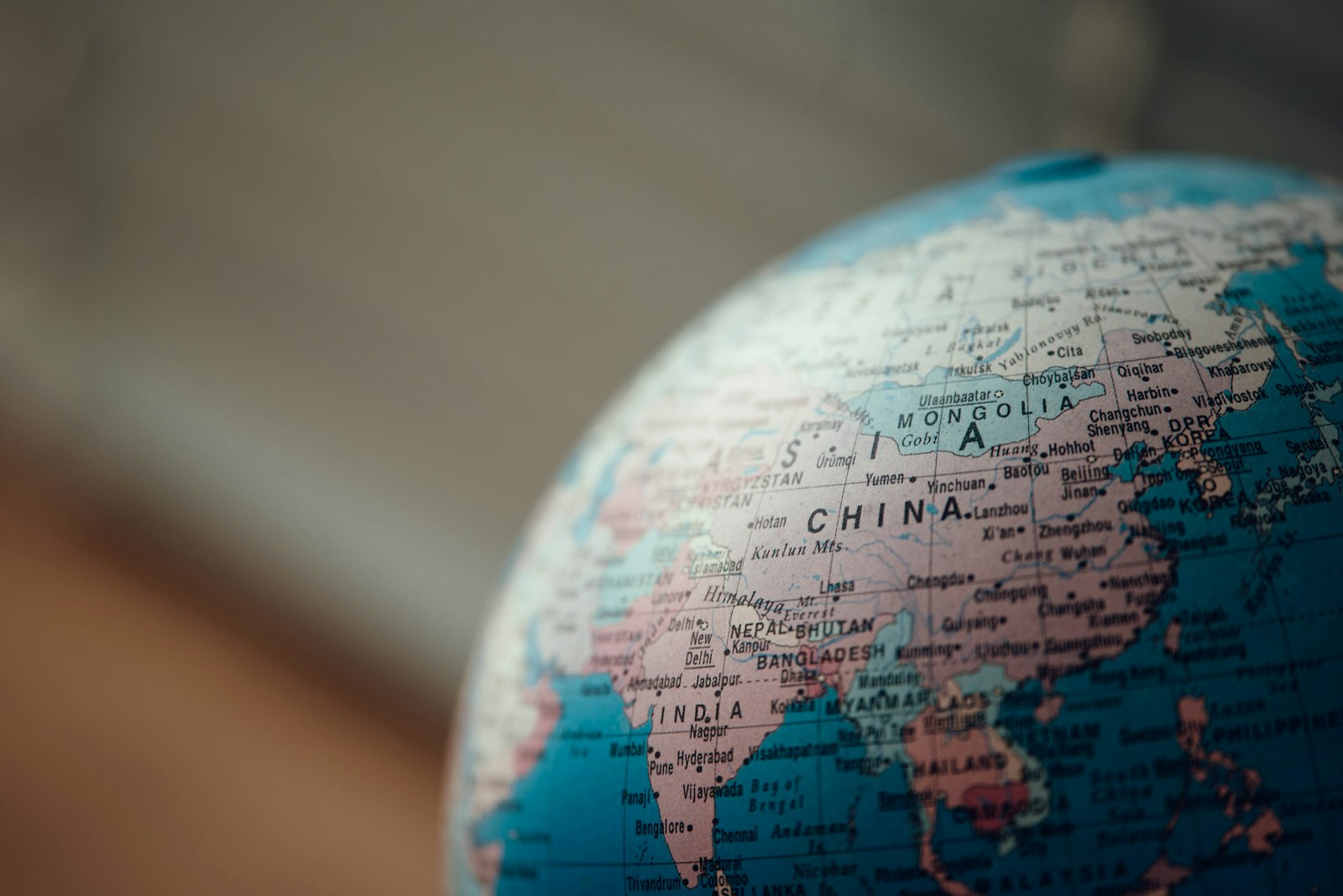 Blue desk globe, representing translating a WordPress website into Spanish with AI